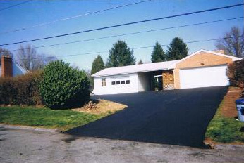 House With Newly Coated Driveway
